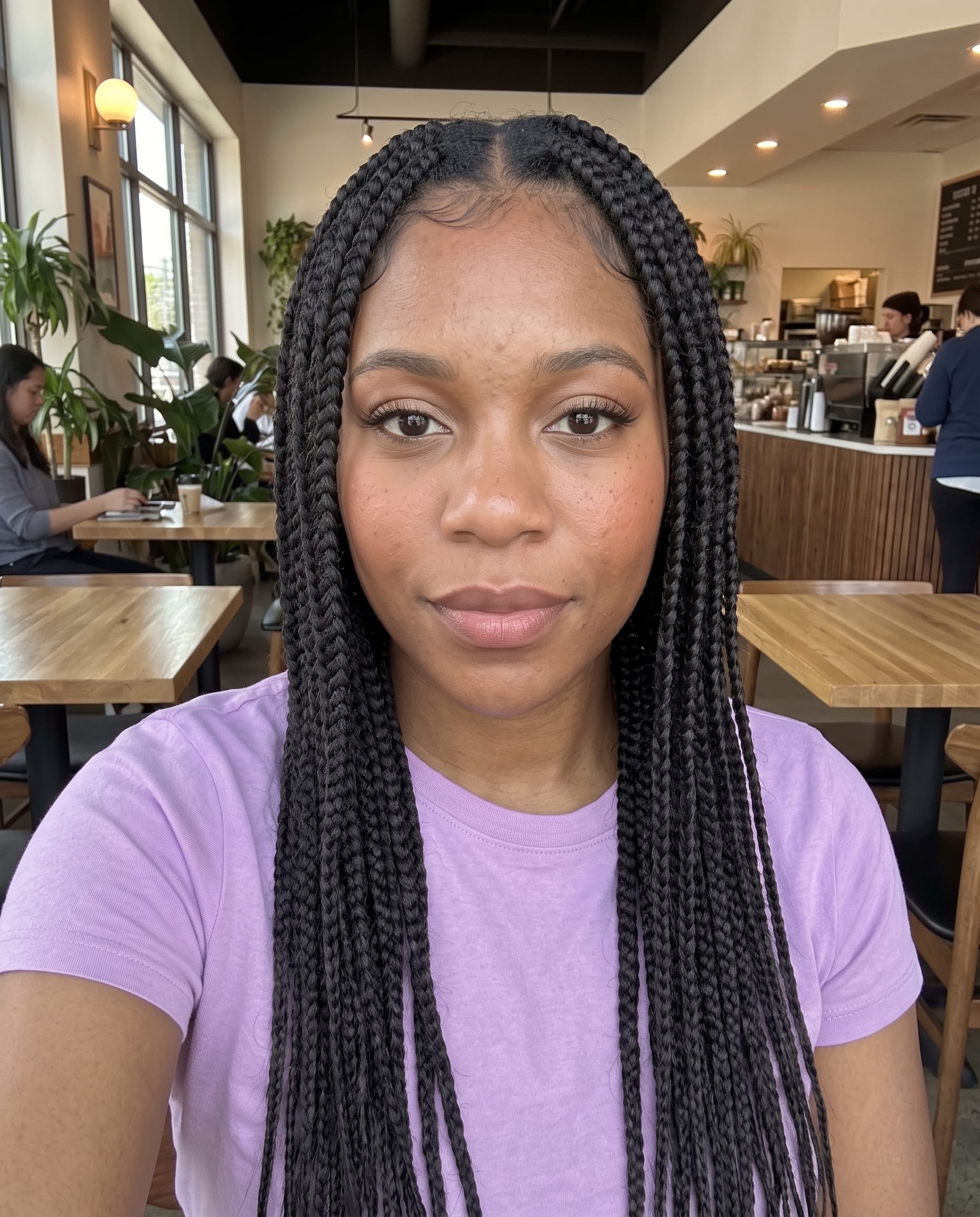 Woman with Box Braids in Cafe example 4