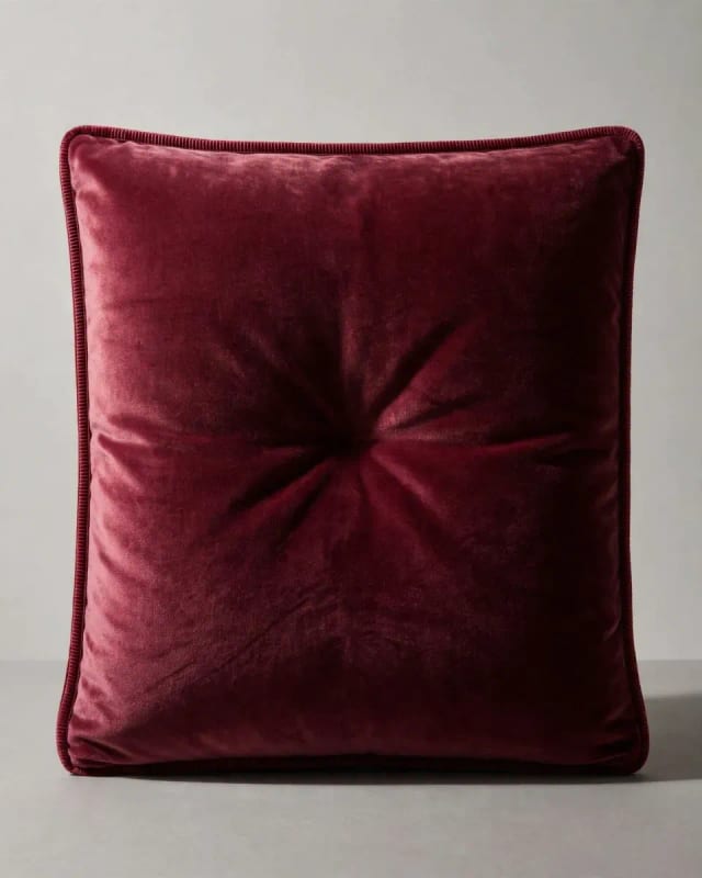 Meta AI illustration: Burgundy velvet cushion