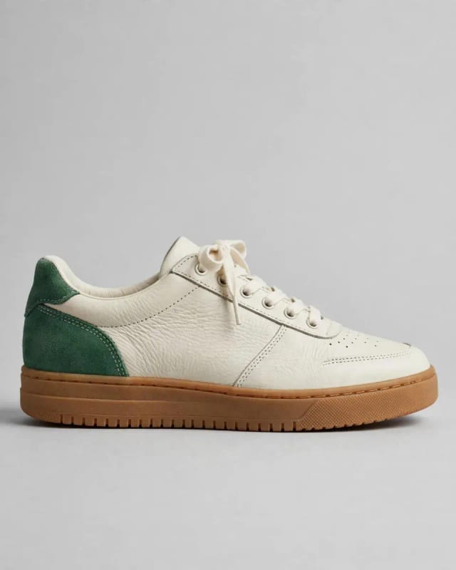 Meta AI illustration: Ivory shoe with green panel